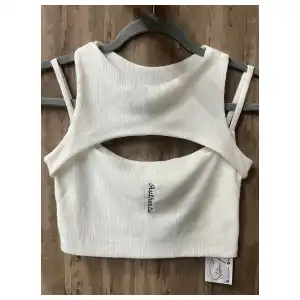 Top Authentic miniatura 1